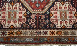 Close-up detail of 2000s Shiraz rug from Iran / Persia showing Cotton weave