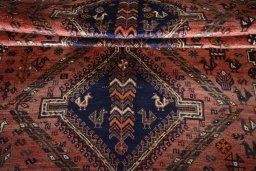 Full view of 2000s Shiraz rug from Iran / Persia, 251 × 172 cm in Red tones