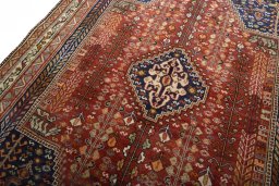Backside of handmade 2000s Shiraz rug showing knot structure and weave density