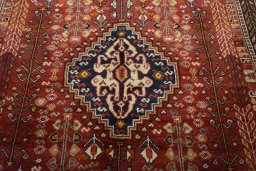 Central medallion detail of 2000s Shiraz rug from Iran / Persia