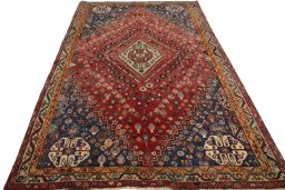 Surface texture of Unknown Shiraz rug with natural Wool and intricate pattern