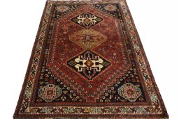 Surface texture of 2000s Shiraz rug with natural Wool and intricate pattern