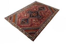 Corner detail of 2000s Shiraz rug showing border pattern and Wool pile
