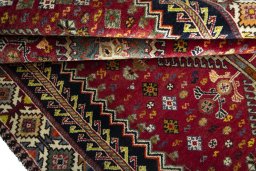Full view of 2000s Shiraz rug from Iran / Persia, 230 × 150 cm in Red tones