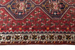 Close-up detail of 2000s Shiraz rug from Iran / Persia showing Wool weave