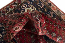 Surface texture of 2000s Shiraz rug with natural Wool and intricate pattern
