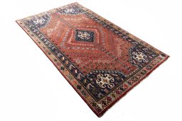 Close-up detail of 2000s Shiraz rug from Iran / Persia showing Wool weave