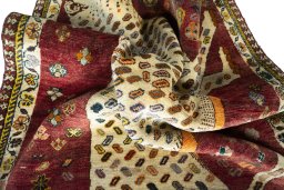 Corner detail of 2000s Shiraz rug showing border pattern and Wool pile