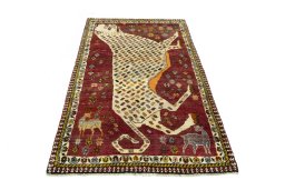 Surface texture of 2000s Shiraz rug with natural Wool and intricate pattern