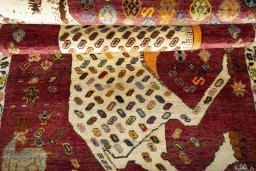 Full view of 2000s Shiraz rug from Iran / Persia, 191 × 112 cm in Red tones