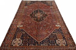 Surface texture of 2000s Shiraz rug with natural Wool and intricate pattern