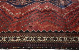 Close-up detail of 2000s Shiraz rug from Iran / Persia showing Wool weave