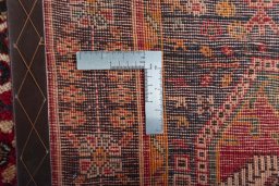 Surface texture of 2000s Shiraz rug with natural Wool and intricate pattern