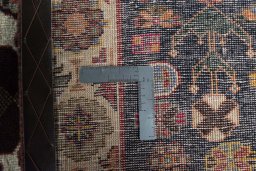 Backside of handmade 2000s Shiraz rug showing knot structure and weave density