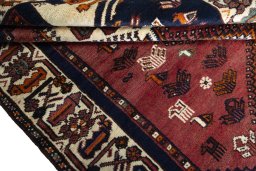 Close-up detail of 2000s Shiraz rug from Iran / Persia showing Wool weave