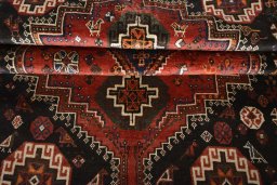 Close-up detail of 2000s Shiraz rug from Iran / Persia showing Wool weave