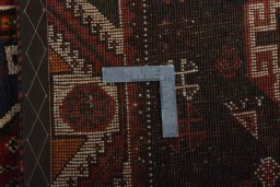 Backside of handmade 2000s Shiraz rug showing knot structure and weave density