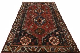 Surface texture of 2000s Shiraz rug with natural Wool and intricate pattern