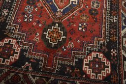 Close-up detail of 2000s Shiraz rug from Iran / Persia showing Wool weave
