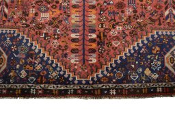 Full view of 2000s Shiraz rug from Iran / Persia, 276 × 159 cm in Red tones