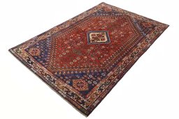 Corner detail of 2000s Shiraz rug showing border pattern and Wool pile