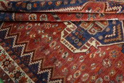 Close-up detail of 2000s Shiraz rug from Iran / Persia showing Wool weave
