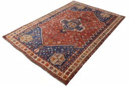 Corner detail of 2000s Shiraz rug showing border pattern and Wool pile