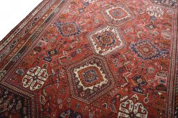 Backside of handmade 2000s Shiraz rug showing knot structure and weave density