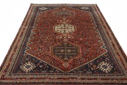 Surface texture of 2000s Shiraz rug with natural Wool and intricate pattern