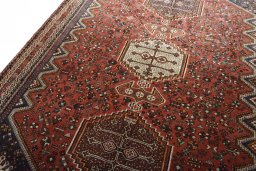 Backside of handmade 2000s Shiraz rug showing knot structure and weave density