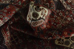 Close-up detail of 2000s Shiraz rug from Iran / Persia showing Wool weave