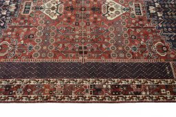 Full view of 2000s Shiraz rug from Iran / Persia, 250 × 180 cm in Red tones