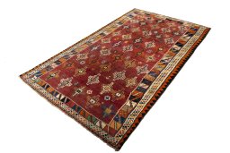 Corner detail of 2000s Shiraz rug showing border pattern and Wool pile
