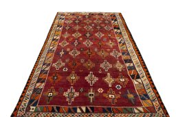 Surface texture of 2000s Shiraz rug with natural Wool and intricate pattern