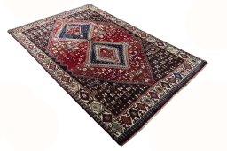 Close-up detail of 2000s Shiraz rug from Iran / Persia showing Wool weave