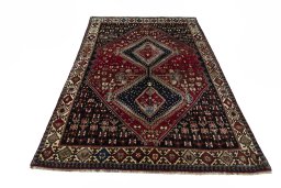 Surface texture of 2000s Shiraz rug with natural Wool and intricate pattern