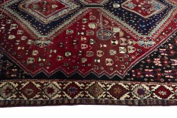 Close-up detail of 2000s Shiraz rug from Iran / Persia showing Wool weave