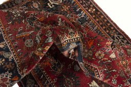 Close-up detail of 2000s Shiraz rug from Iran / Persia showing Wool weave