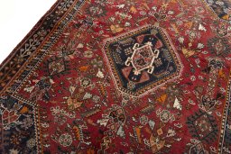Backside of handmade 2000s Shiraz rug showing knot structure and weave density