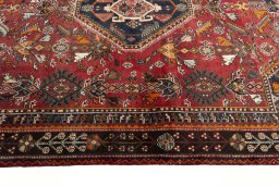 Full view of 2000s Shiraz rug from Iran / Persia, 255 × 164 cm in Red tones