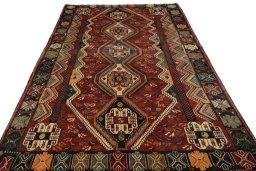Surface texture of 2000s Shiraz rug with natural Wool and intricate pattern