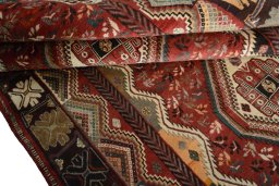 Full view of 2000s Shiraz rug from Iran / Persia, 280 × 170 cm in Red tones
