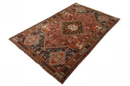 Corner detail of 2000s Shiraz rug showing border pattern and Wool pile