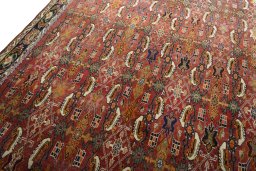 Backside of handmade 2000s Shiraz rug showing knot structure and weave density