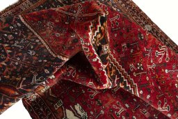 Close-up detail of 2000s Shiraz rug from Iran / Persia showing Wool weave