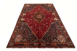 Surface texture of 2000s Shiraz rug with natural Wool and intricate pattern