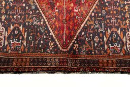 Close-up detail of 2000s Shiraz rug from Iran / Persia showing Wool weave