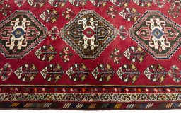Close-up detail of 2000s Shiraz rug from Iran / Persia showing Wool weave