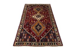 Surface texture of 2000s Shiraz rug with natural Wool and intricate pattern