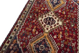 Backside of handmade 2000s Shiraz rug showing knot structure and weave density